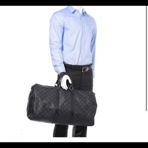 This is an authentic LOUIS VUITTON Monogram Eclipse Keepall Bandouliere 55.